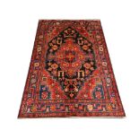 Persian Nahavand rug, 2.05m x 1.35m. Condition rating A.