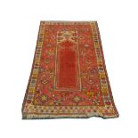 Early 20th Century Turkish melas rug, 1.42m x 0.95m. Condition rating B/C.