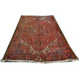 Persian  Heriz carpet, mid 20th Century, 3.29m x 2.32m. Condition rating D.