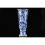 A CHINESE BLUE AND WHITE DEEP BEAKER.
Qing Dynasty, Kangxi era.
With fluted sides, with a dense