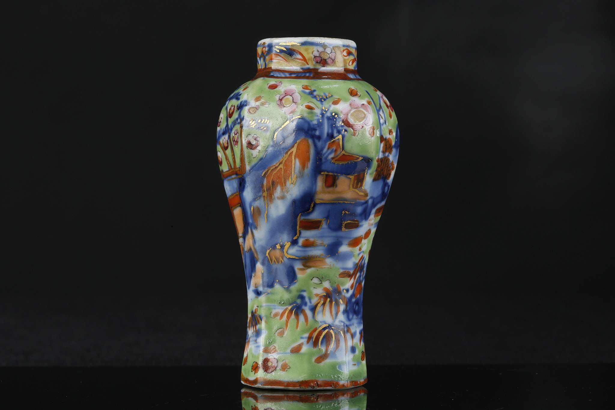 A CHINESE CLOBBERED MINIATURE BLUE AND WHITE VASE.
Qing Dynasty.
Of octagonal section, decorated - Image 2 of 6