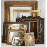 A collection of picture frames to include a good C