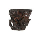 A CARVED BAMBOO LIBATION CUP.
20th Century.
11cm H.

20世纪 竹雕花纹杯