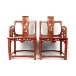 A PAIR OF RED LACQUER PAINTED CHAIRS.
19th / 20th Century.
The sides of each are carved with