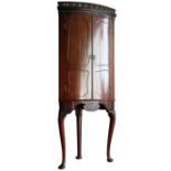 An 18th Century, Irish mahogany corner cabinet on