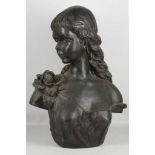 OTC 1999, a bronzed portrait bust of a young girl,