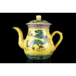 A CHINESE YELLOW GROUND DRAGON TEAPOT AND COVER.R