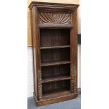 A carved Indian hardwood set of four floor standing open shelves, raised on a plinth. 223 x 110 x