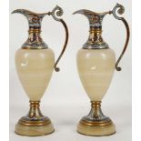 A pair of continental champleve, enamel and onyx u