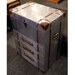 An aluminium and leather clad aviation chest with a lift up trunk top and three drawers. 60 x 40 x