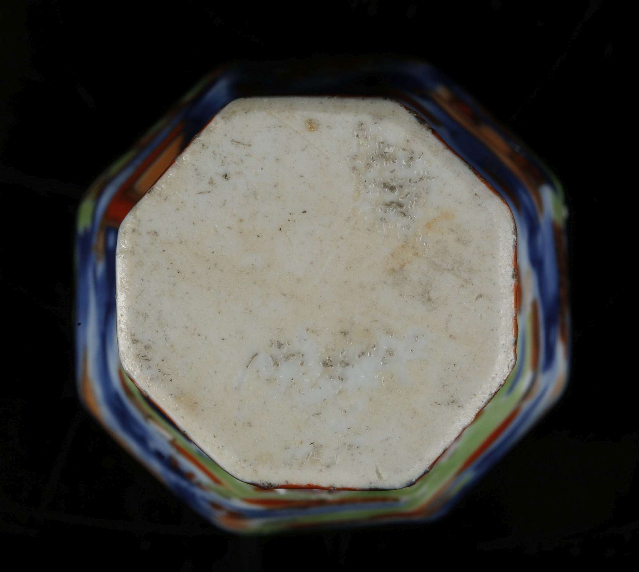 A CHINESE CLOBBERED MINIATURE BLUE AND WHITE VASE.
Qing Dynasty.
Of octagonal section, decorated - Image 6 of 6