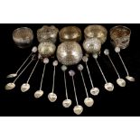 A collection of six small white metal Burmese dishes/bowls with finely chased repousse decoration,