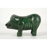 A CHINESE GREEN GLAZED BISCUIT WATER LION DOG FORM