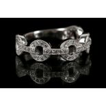 A cubic zircona Chanel style ring.  
Size: P½.