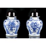 A PAIR OF BLUE AND WHITE VASES.
Qing Dynasty, Kangxi era.
Of baluster form, each side decorated with