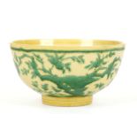 A CHINESE YELLOW AND GREEN BOWL.
Qing Dynasty, Kangxi mark and of the period.
With rounded sides