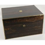 A Victorian coromondel and brass mounted work box