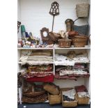A selection of textiles and needlework baskets etc
