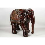 A decorative elephant ornament with jewelled cerem