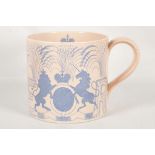 A Wedgwood earthenware mug to commemorate the coro