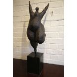 Botero style bronze figure of a dancing woman. 87c