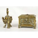 An early 20th century Gothic revival heavy brass jewellery casket, having burgundy silk interior,