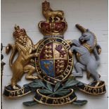 Polychrome coat of arms. 75cm high.