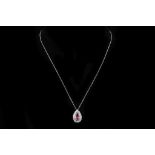 A platinum ruby and diamond teardrop pendant and c