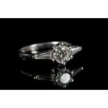 An 18ct white gold and diamond engagement ring, th