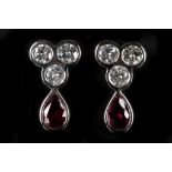 A pair of 18k white gold, ruby and diamond drop ea