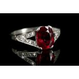 A platinum, ruby and diamond ring, ruby: certifica