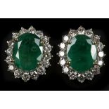 A pair of 18k white & yellow gold large emerald