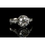 A vintage 18ct white gold and diamond solitaire ri