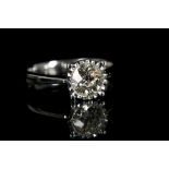An 18k white gold, old cut solitaire diamond ring,