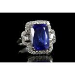 An 18k white gold, large tanzanite and diamond clu