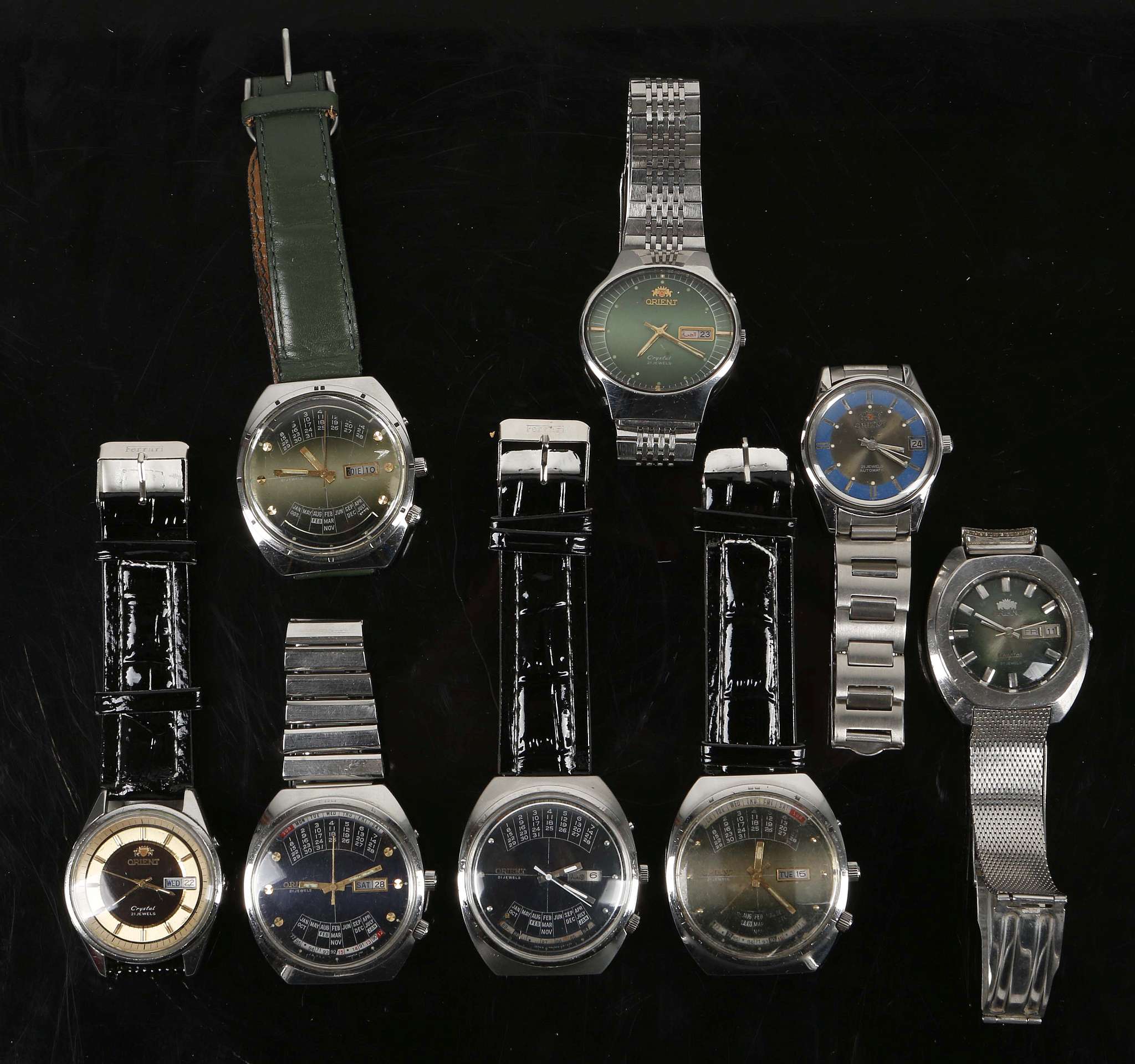 Four 1970's Orient, full calendar gent's wristwatches and four other Orient wristwatches. (8).