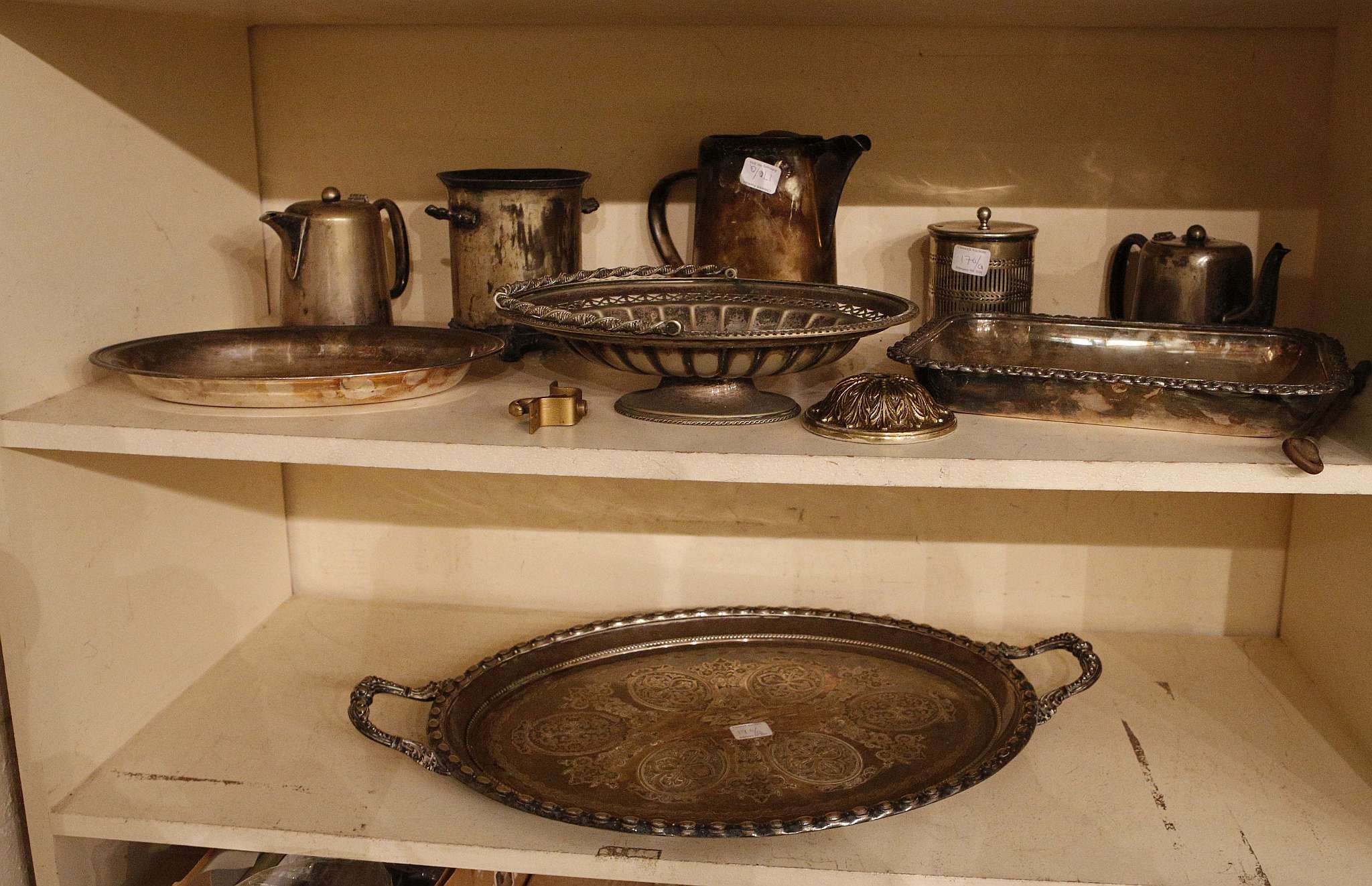 A miscellaneous collection of silver plate items to include a twin-handled tray, entree dish and