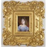 A late 18th century, portrait miniature of a lady in blue dress, gilt mounted.