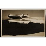 MALCOLM CAMPBELL (1921-1967), a sepia postcard depicting Bluebird, the boat, signed on the back '