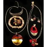 A small collection of Murano jewellery including pendants, earrings, bracelet and bangle.