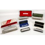 A cased chromatic harmonica by M. Hohner 'The Larry Adler Professional 16' model. Being sold