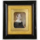 A mounted portrait miniature of a lady in black dress, English, 18th century.