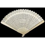 A fine 19th century Cantonese ivory fan, the individual tines delicately carved with pierced