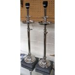 A pair of chrome candlestick style table lamps with adjustable columns. (2).