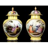 A pair of 'Augustus Rex' style yellow ground vases and covers, 19th century. Possibly decorated in