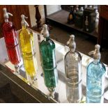 'Martin and Freres Cie', five coloured glass Seltzer bottle in red, yellow, green, blue and smoked