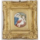 A gilt mounted portrait miniature of a mother with two children.
