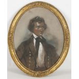 A large framed oval pastel portrait of a young naval gentleman (Charles T.C. Grant), 38.5cm x 30.