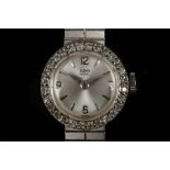A ladies Rolex Tudor Royal 9ct white gold and diamond set wrist watch, with gold bracelet, in