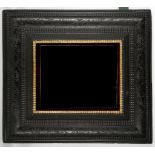 Circa 17th century. An ebonised picture frame with